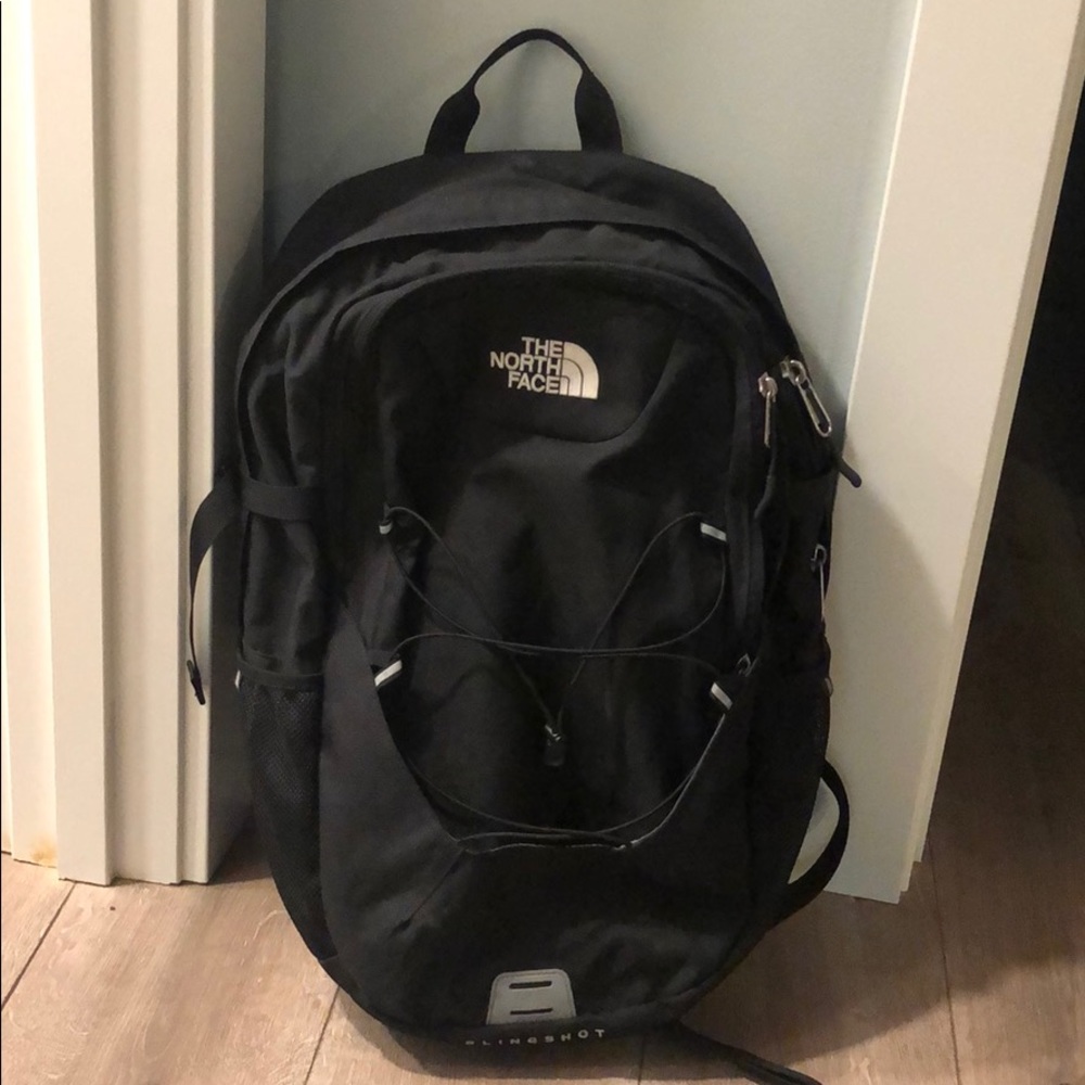 Black north face book bag